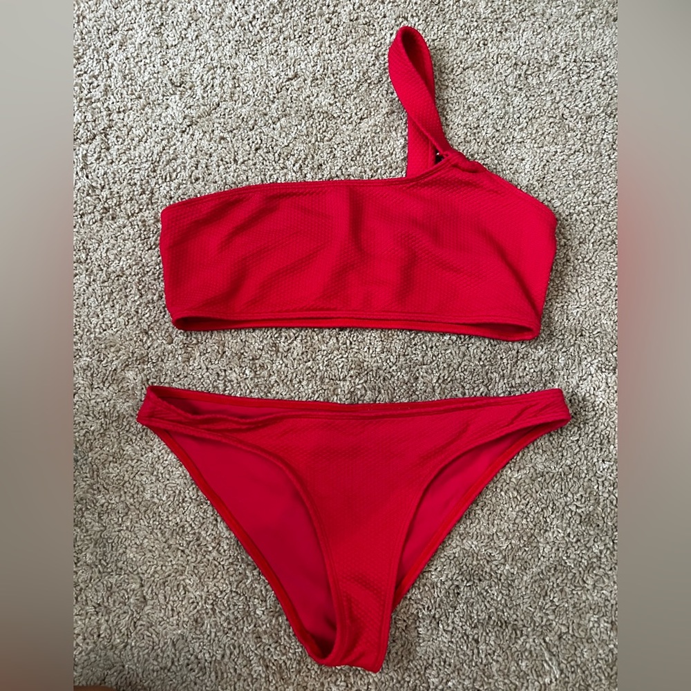 House of Harlow from Revolve red one shoulder bikini. Small bottom, medium top.